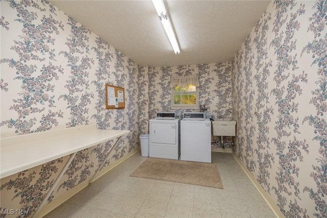 laundry area featuring laundry area and wallpapered walls