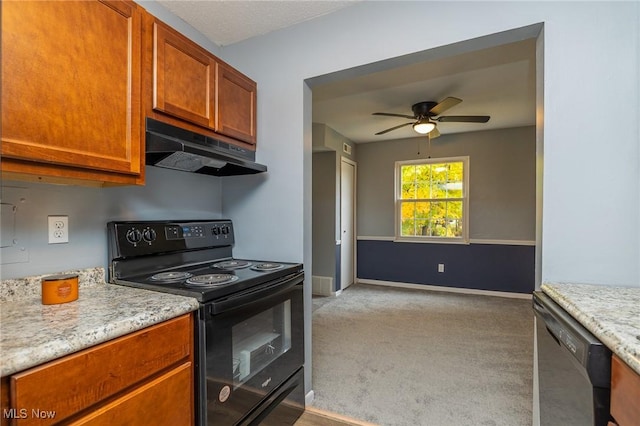 kitchen with light carpet, dishwashing machine, brown cabinets, black electric range oven, and under cabinet range hood