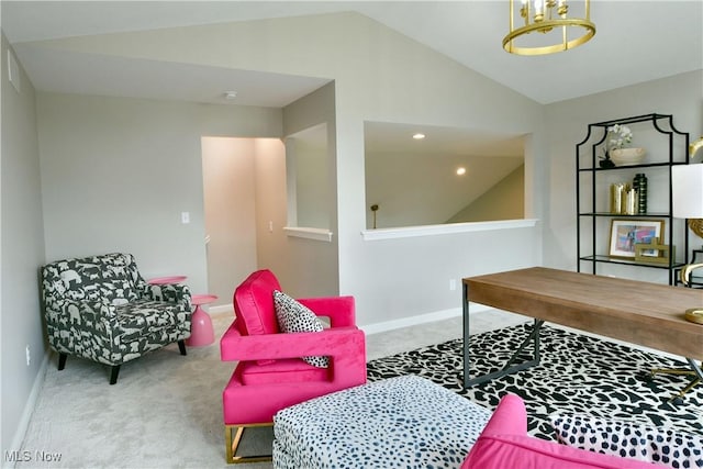 carpeted office with baseboards and vaulted ceiling