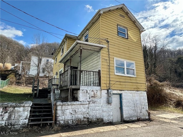 546 Rose St, Follansbee, WV 26037 - view of side of property with stairs