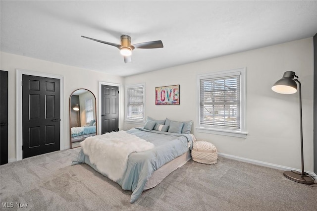 bedroom featuring carpet flooring, ceiling fan, and baseboards