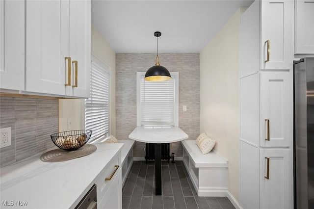 dining room with baseboards