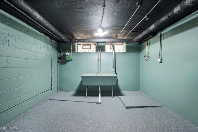 basement with a sink