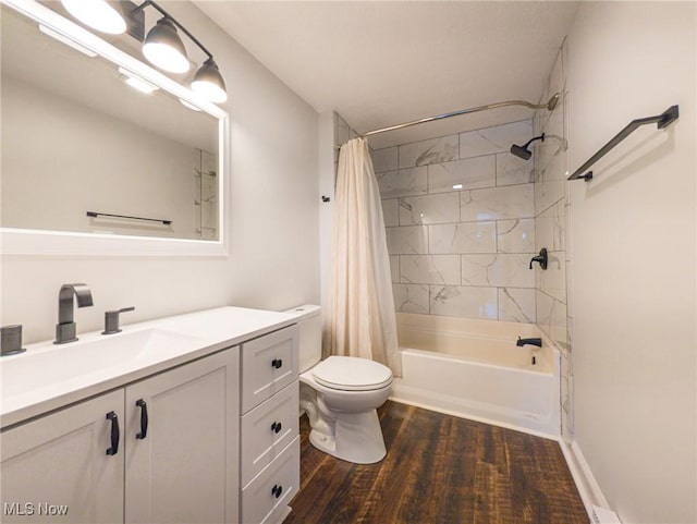 full bath with vanity, wood finished floors, toilet, and shower / tub combo with curtain