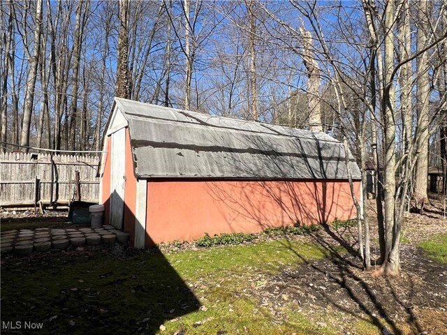 5123 4th Ave, Andover, OH 44003 - view of side of home with a barn, an outbuilding, and a gambrel roof