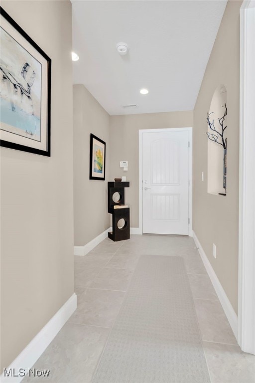 7571 Silverleaf Ct, Sagamore Hills, OH 44067 - corridor featuring light tile patterned flooring and recessed lighting