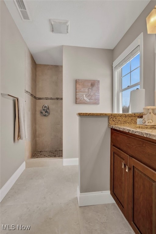 7571 Silverleaf Ct, Sagamore Hills, OH 44067 - bathroom featuring a walk in shower and vanity
