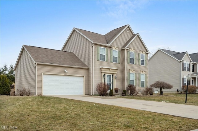 traditional-style house featuring an attached garage, driveway, and a front lawn