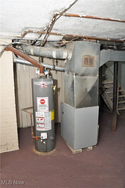 utilities featuring heating unit and gas water heater