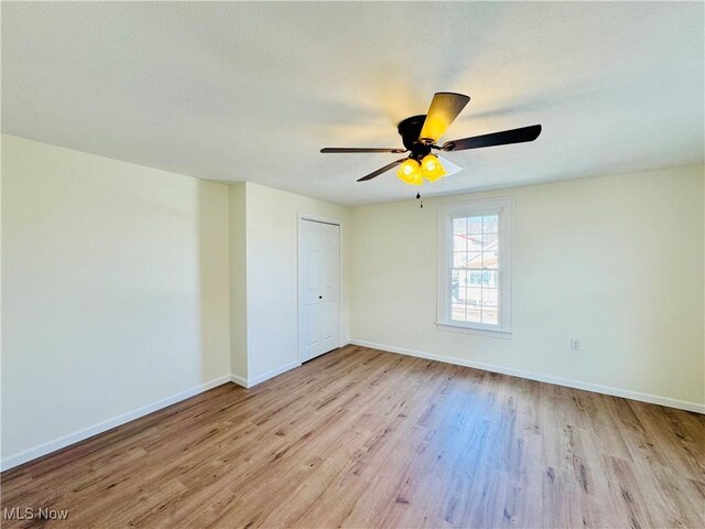 1019 Trenton, Toronto, OH 43964 - unfurnished room with a ceiling fan, baseboards, and wood finished floors