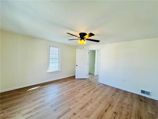 1019 Trenton, Toronto, OH 43964 - unfurnished bedroom with ceiling fan, light wood-style flooring, visible vents, and baseboards