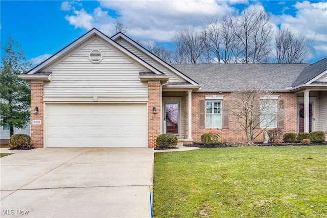 ranch-style home with an attached garage, concrete driveway, brick siding, and a front yard