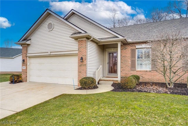 ranch-style house featuring brick siding, a shingled roof, an attached garage, driveway, and a front lawn