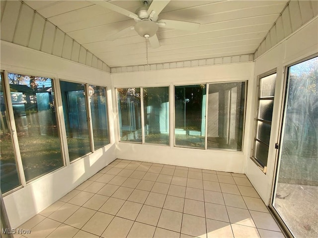 unfurnished sunroom with wood ceiling, vaulted ceiling, and ceiling fan