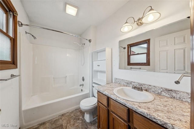 bathroom with toilet, shower / bath combination, and vanity