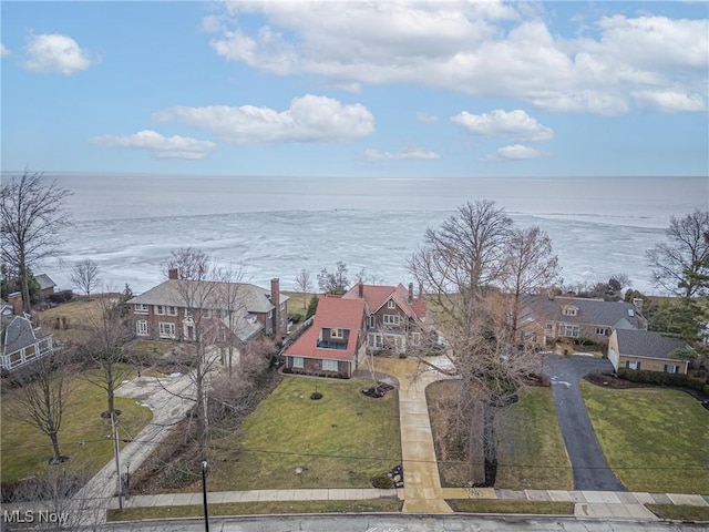 aerial view featuring a water view and a residential view