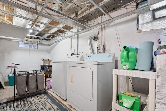 washroom with laundry area and washing machine and clothes dryer