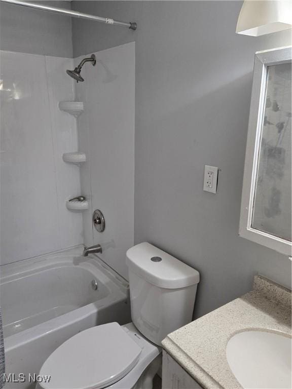 full bathroom with toilet, tub / shower combination, and vanity