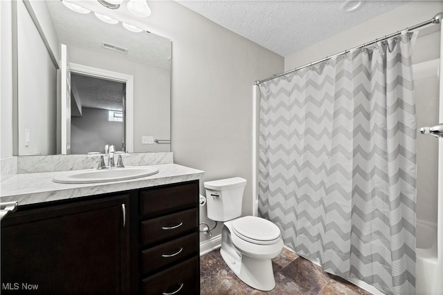 bathroom featuring visible vents, toilet, vanity, a textured ceiling, and a shower with curtain