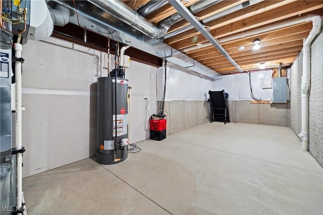 unfinished below grade area with water heater, brick wall, and electric panel