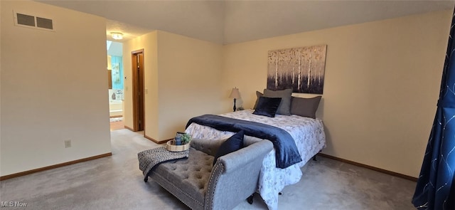 carpeted bedroom with baseboards and visible vents