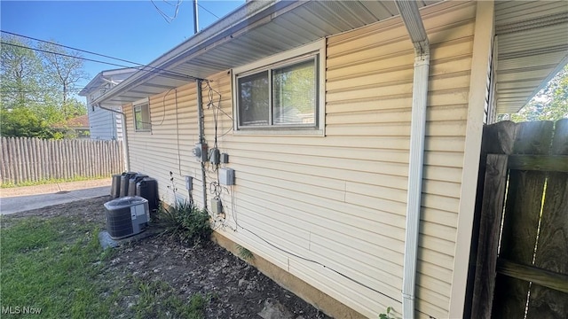 5031 Cato St, Maple Heights, OH 44137 - view of side of property with fence and central AC