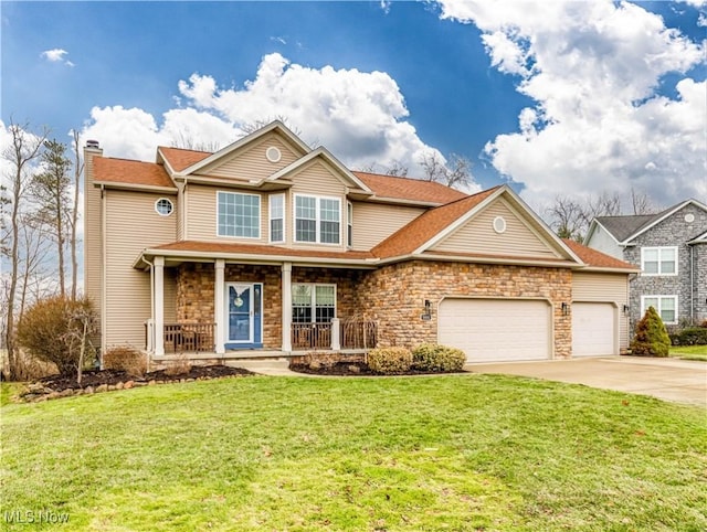 view of front of home featuring a chimney, covered porch, an attached garage, driveway, and a front lawn