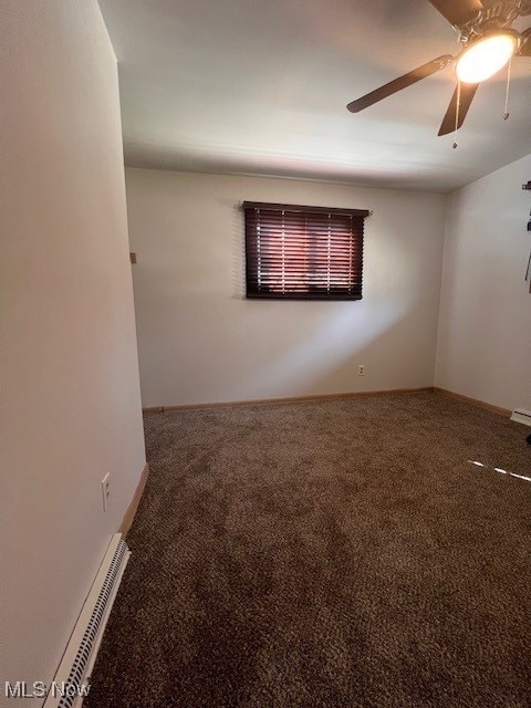 unfurnished room featuring carpet, visible vents, baseboards, and a ceiling fan