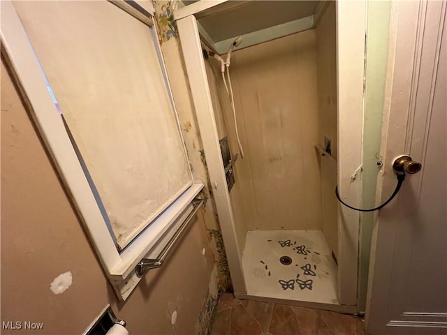 full bath featuring a stall shower