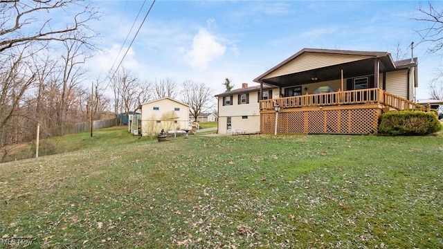 back of property featuring a lawn