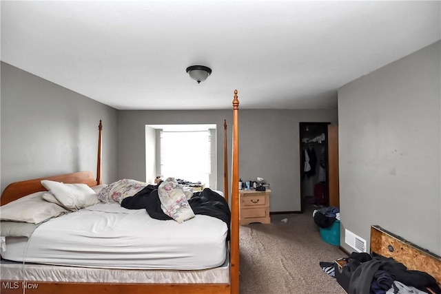 bedroom featuring visible vents and carpet flooring