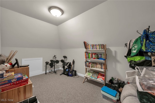 game room with carpet floors, vaulted ceiling, and baseboards