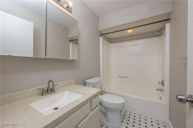 bathroom featuring shower / tub combination, vanity, and toilet