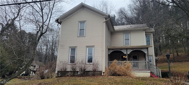 traditional-style home with covered porch