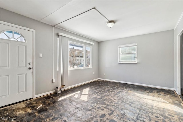 entryway featuring baseboards