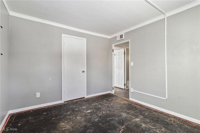 unfurnished bedroom with baseboards, visible vents, and crown molding