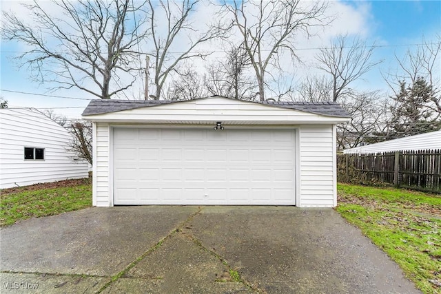 detached garage with fence