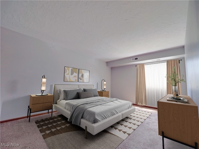 bedroom with carpet, visible vents, a textured ceiling, and baseboards