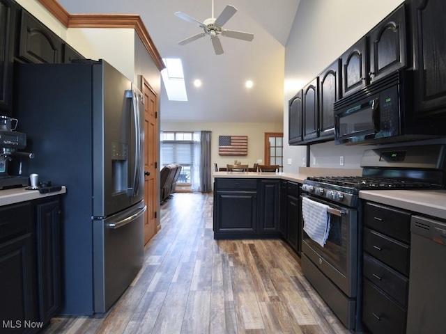 3945 Wheeler Creek Rd, Geneva, OH 44041 - kitchen featuring stainless steel appliances, a peninsula, light countertops, and ceiling fan