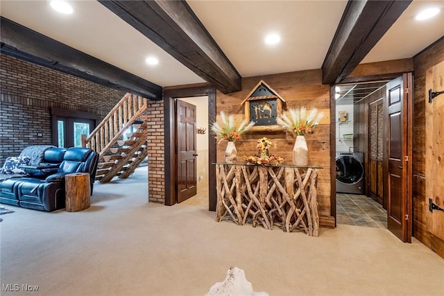 wine cellar featuring carpet, beam ceiling, and wooden walls