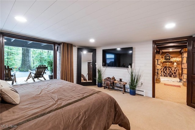 carpeted bedroom featuring recessed lighting and access to exterior