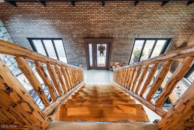 stairs with brick wall