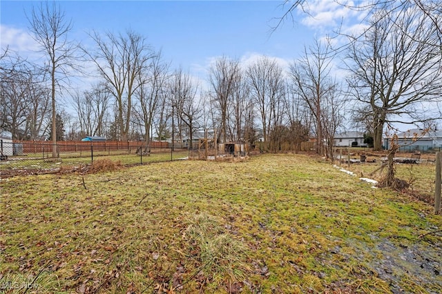 view of yard with fence