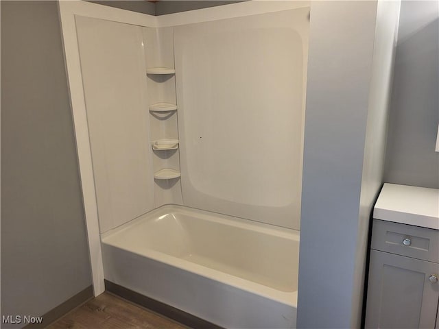 7443 Spillway Rd Lot 25, Lisbon, OH 44432 - bathroom with shower / bathtub combination, wood finished floors, and baseboards