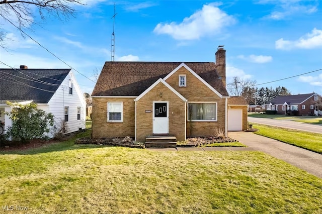 bungalow with brick siding, a chimney, and a front lawn