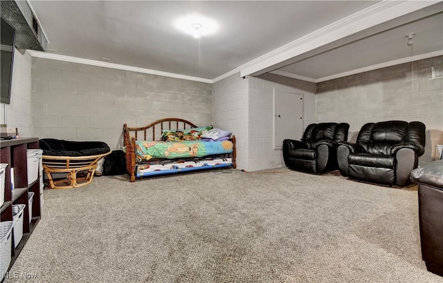 carpeted bedroom with concrete block wall and ornamental molding