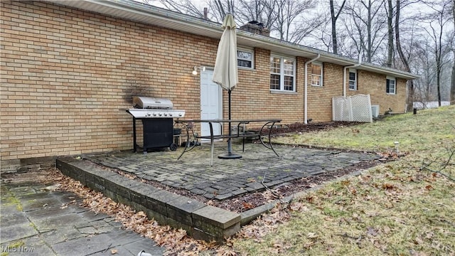 view of patio with a grill