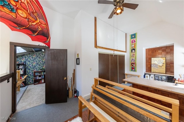 bedroom with carpet flooring and vaulted ceiling