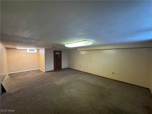 below grade area with carpet floors and baseboards