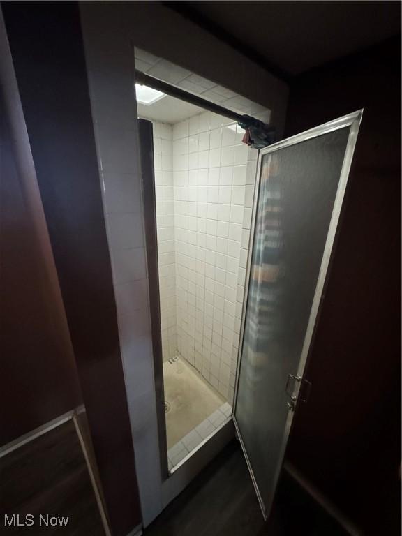 bathroom featuring a stall shower